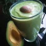 Blending Avocado Banana Spinach Smoothie in a Blender