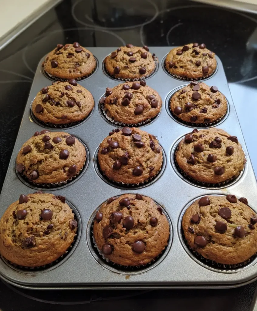 Mashing ripe bananas for healthy chocolate chip banana bread muffins