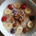 Quinoa flakes porridge with fresh fruits and nuts