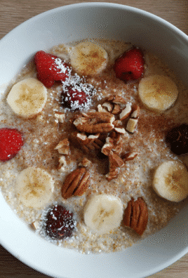 Quinoa flakes porridge with fresh fruits and nuts