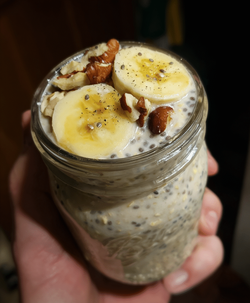 Ingredients for overnight oats with banana and chia seeds laid out on the kitchen counter.