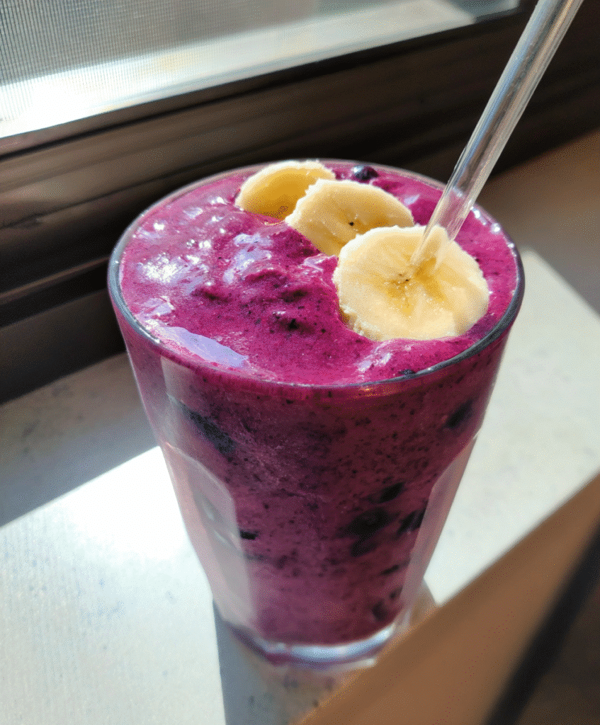 Serving blueberry smoothie