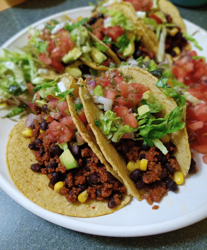 Black bean taco ingredients laid out flat