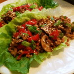 Healthy Chicken Lettuce Wraps served fresh on a white plate