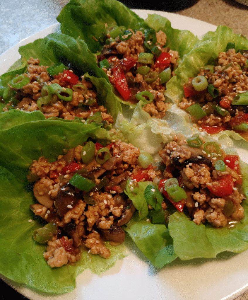 Ingredients for Healthy Chicken Lettuce Wraps on a kitchen counter