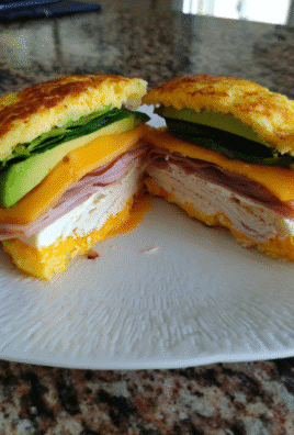 keto cloud bread sandwich on wooden plate
