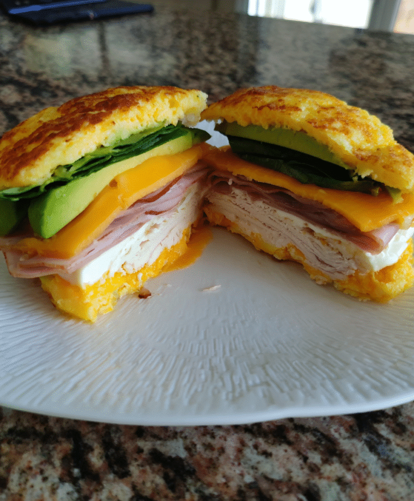 keto cloud bread sandwich on wooden plate