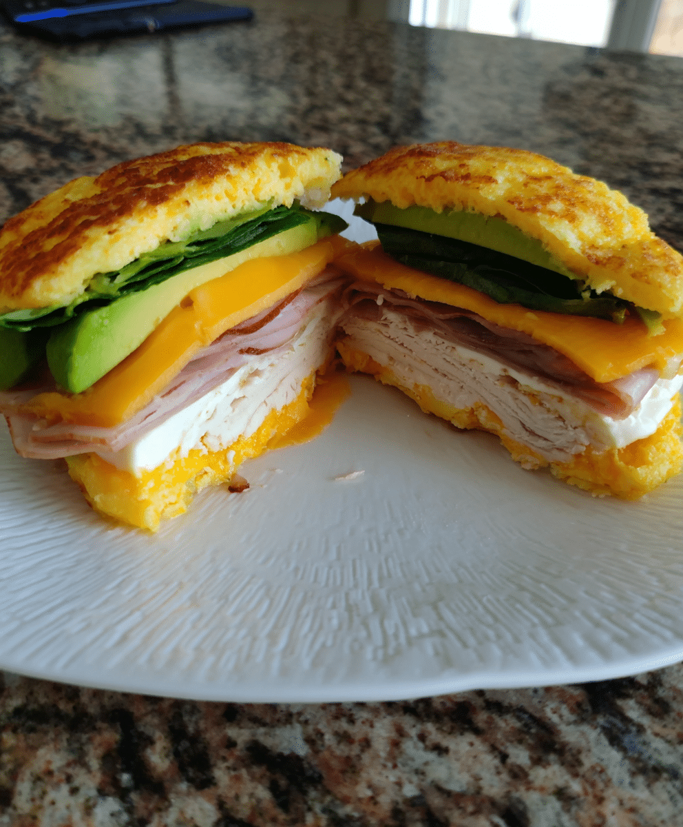 keto cloud bread sandwich on wooden plate