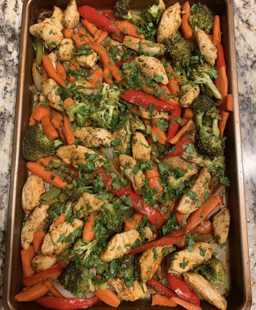 Raw ingredients for sheet pan chicken and vegetables