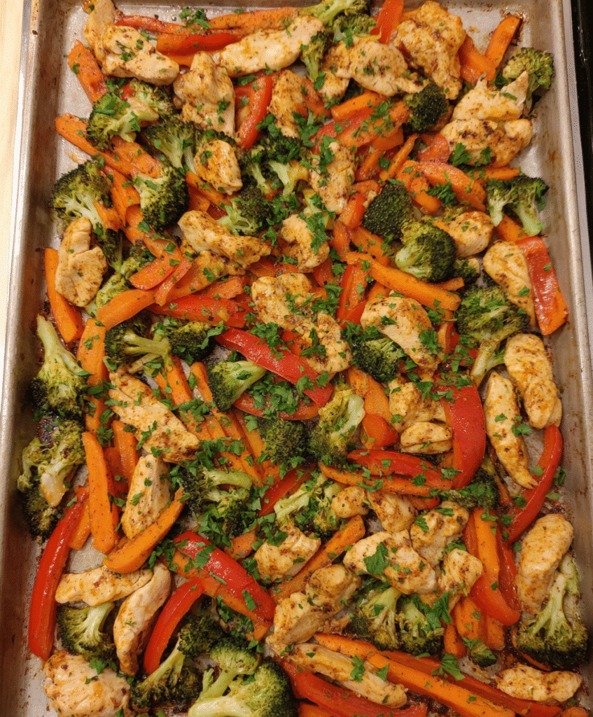 Served roasted sheet pan chicken and vegetables